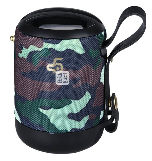 Camouflage-patterned portable speaker with a handle on a white background