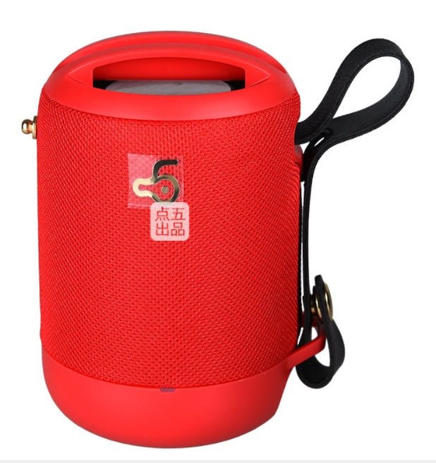 Red portable speaker with a strap on a white background