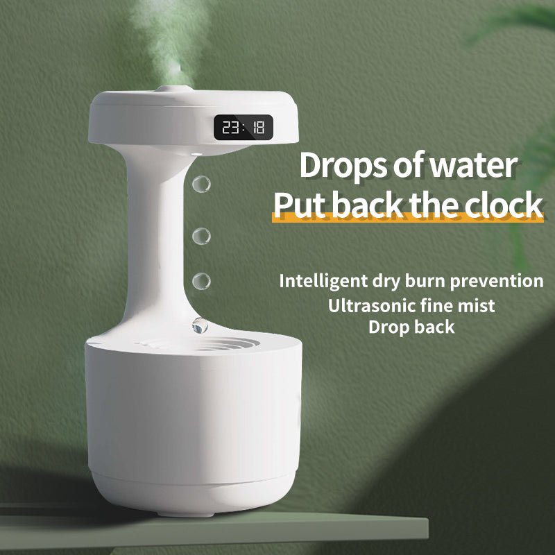 White ultrasonic humidifier with digital display on a green background
