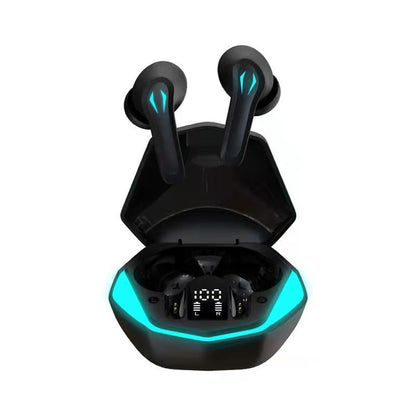Black wireless earbuds with blue accents in an open charging case on a white background