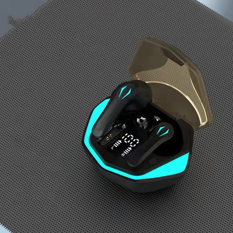 Wireless earbuds in a charging case with blue accents on a textured gray surface