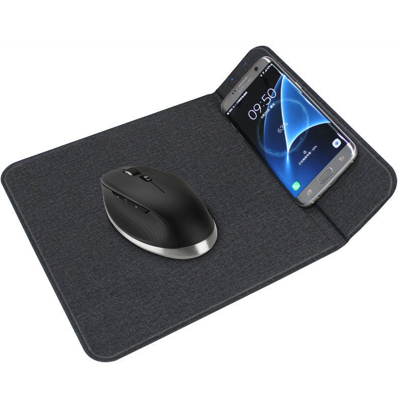 Black mouse pad with a wireless mouse and smartphone on a white background