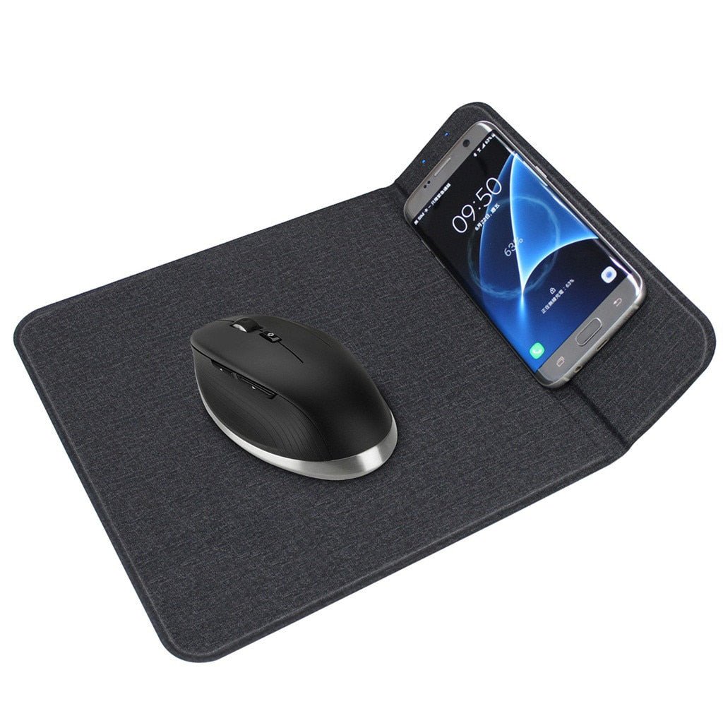Black mouse pad with a mouse and smartphone on a white background