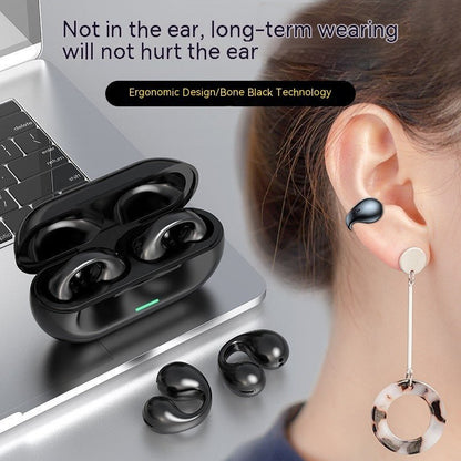 Black wireless earbuds with charging case on a laptop, showing ergonomic design and bone conduction technology.