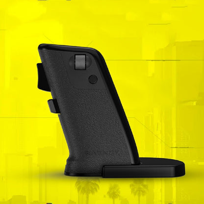Black phone stand on a yellow background