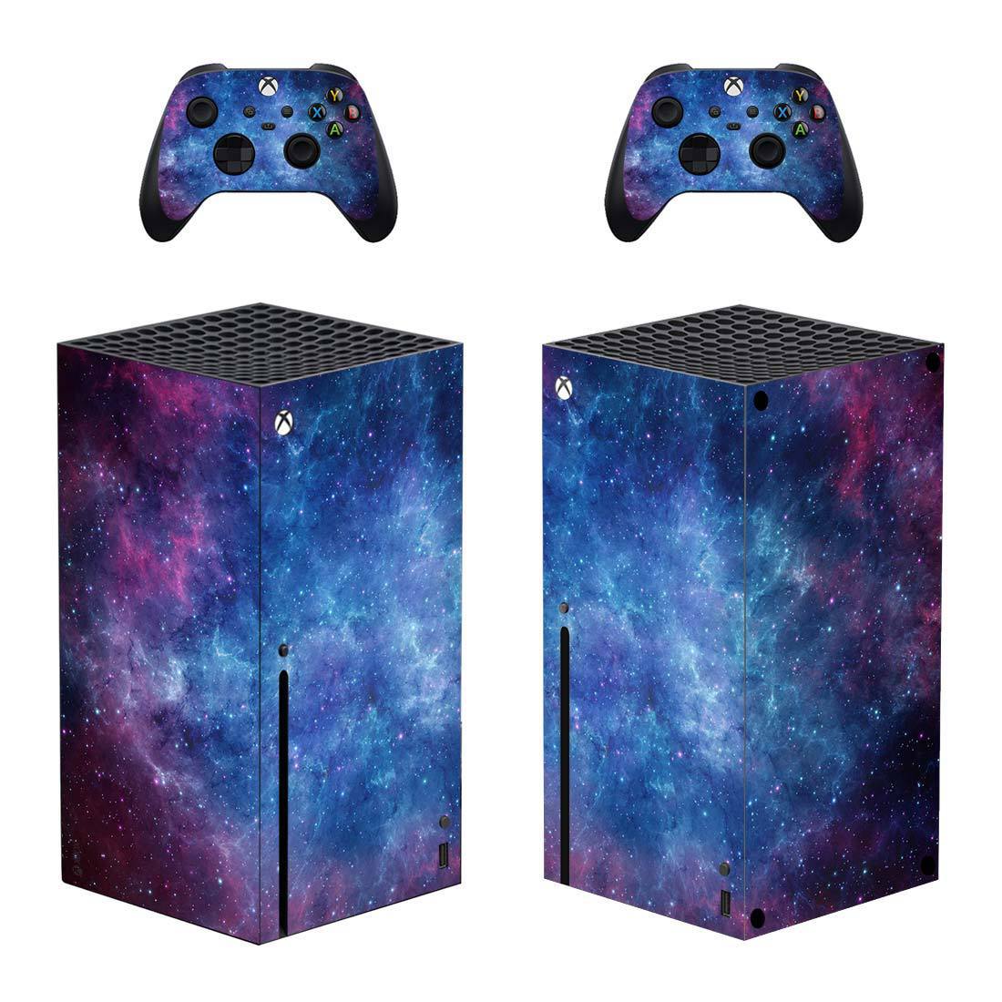 Gaming console and controllers with a galaxy-themed skin on a white background